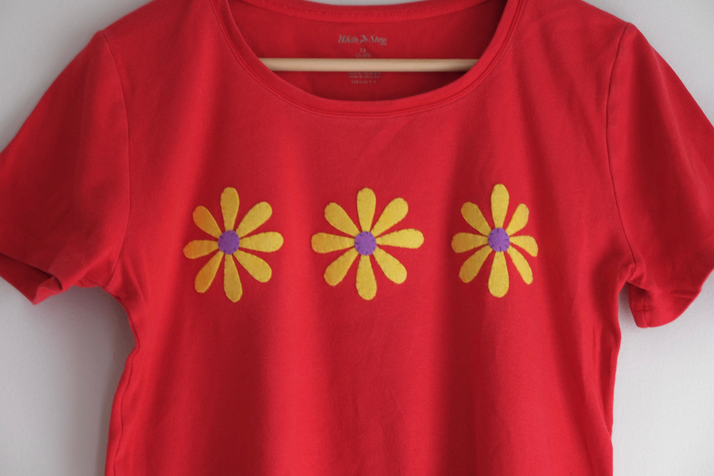 red t-shirt with flowers