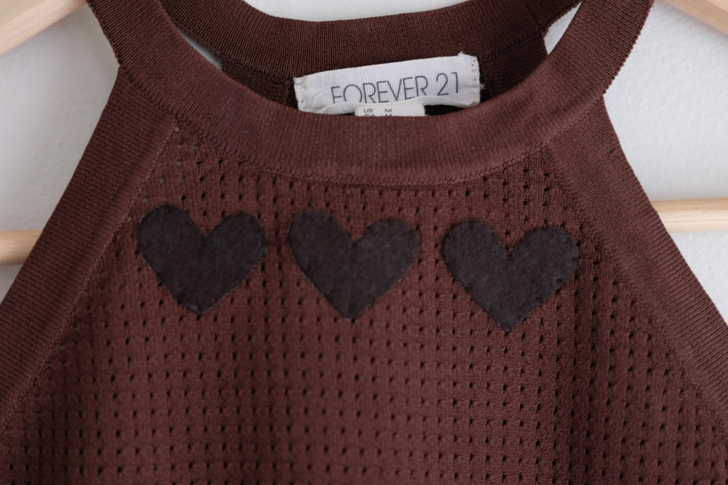 brown tank with hearts